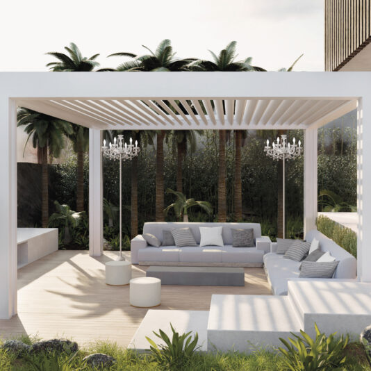 Outdoor Chandelier Floor Lamp Modern outdoor patio with white pergola, sectional sofas, small round tables, and pillows. Two chandeliers hang overhead amid lush greenery and palms. Enhance the ambiance by adding the Outdoor Chandelier Floor Lamp.