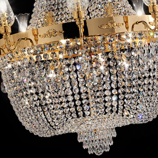 Large Italian Crystal Empire Style Chandelier The Large Italian Crystal Empire Style Chandelier, adorned with sparkling Swarovski crystal beads and lit bulbs, features a luxurious multi-tiered design with intricate details, casting a warm glow in an elegant display.