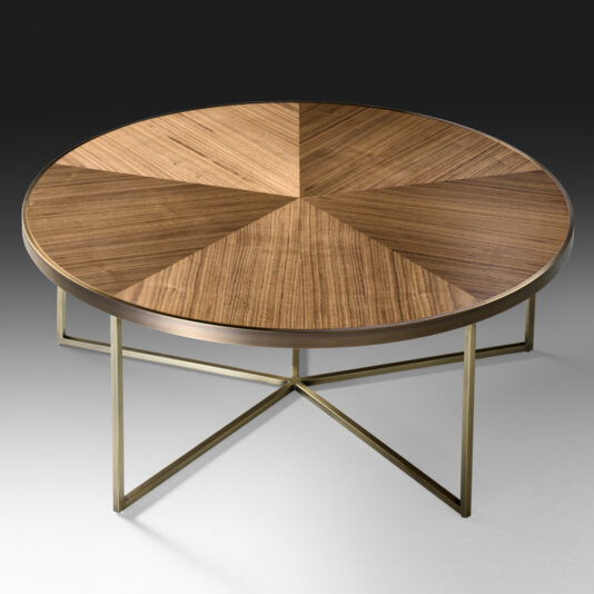 The Contemporary Walnut Designer Coffee Table features a wooden sunburst-patterned walnut top, elegantly supported by a brass metal frame with intersecting legs, creating a modern and sophisticated design. It is beautifully set against a grey background.