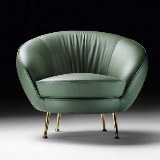 The Contemporary Designer Leather Occasional Armchair is a high-end designer piece that combines modern elegance with a striking green hue. It features a rounded backrest, slim gold legs against a dark background, and includes a cushioned seat for added comfort, making it an ideal accent for any contemporary setting.