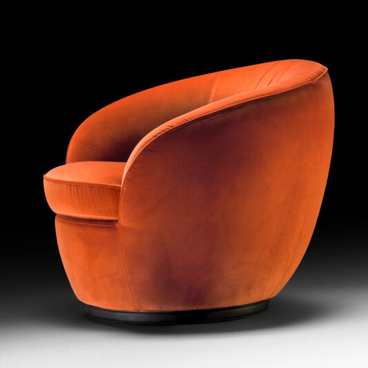 The Luxury Designer Velvet Swivel Armchair in a vibrant orange hue showcases a curved, rounded backrest and a cushioned seat, all set on an elegant dark circular base, against a sophisticated black background.