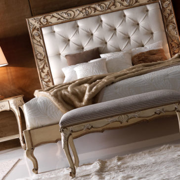 Antiqued Italian Button Upholstered Bed With Ornate Carvings Antiqued Italian Button Upholstered Bed With Ornate Carvings