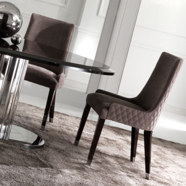 Black Oval Dining Table Including Eight Nubuck Dining Chairs