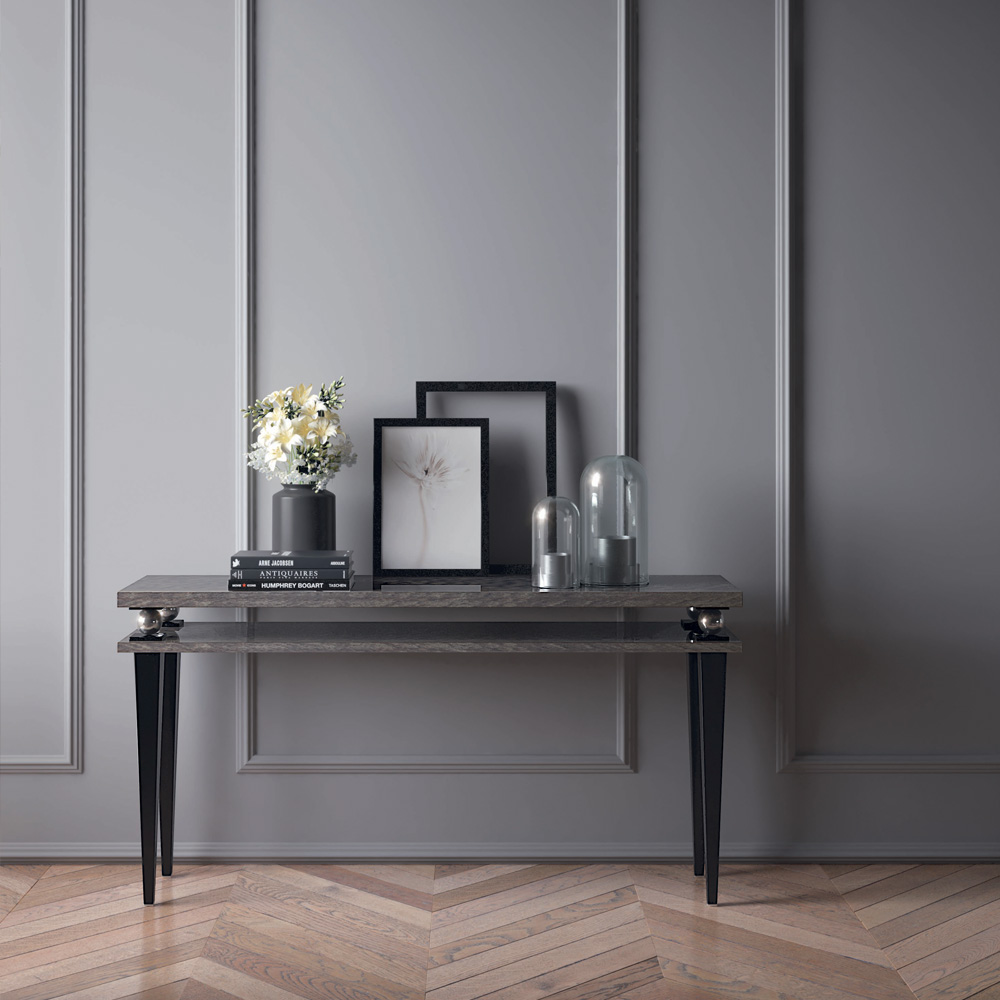 Italian Designer Tiered Sphere Console Table shown in a hallway decorated in grey panels