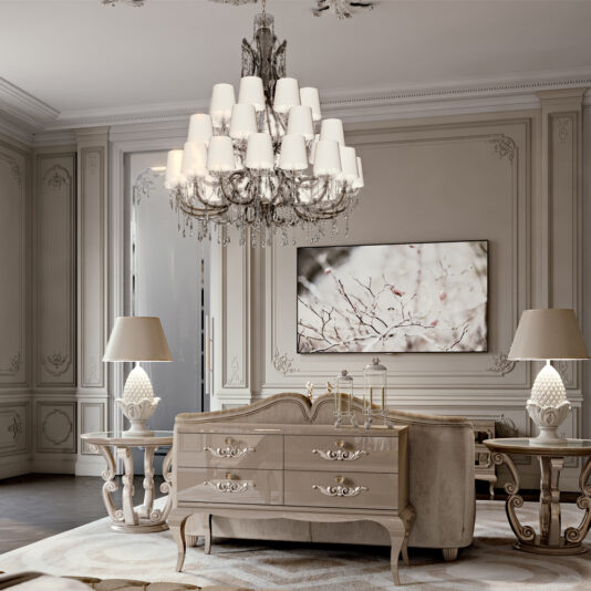 Large Exclusive Italian Crystal Chandelier A sophisticated living room features ornate beige walls, an elegant large Exclusive Italian Crystal Chandelier with multiple lampshades, a classic wood dresser with intricate carvings, and two matching side tables with decorative lamps. A large piece of nature-themed artwork adorns the wall.