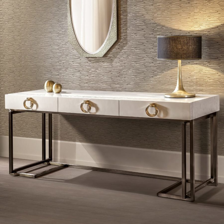 Bespoke furniture finishes: mother-of-pearl console table with pale-gold ring handles and a brushed-bronzed base