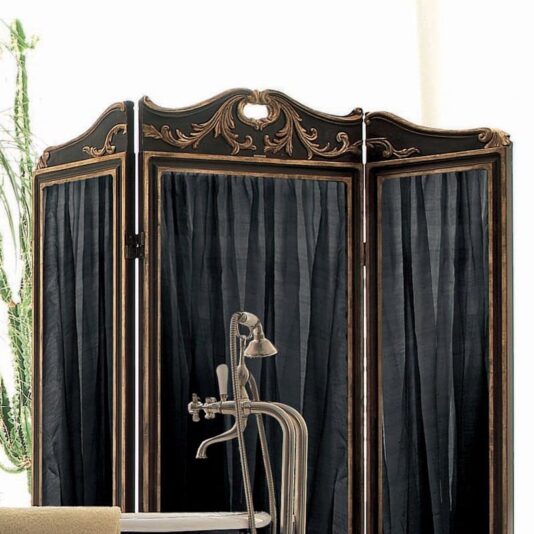 Exclusive Black and Gold Italian Dressing Screen An Exclusive Black and Gold Italian Dressing Screen, featuring three ornate gold-trimmed black frames and sheer black curtains, stands behind a vintage-style bathtub with an antique faucet and showerhead. A tall green cactus is partially visible on the left side.