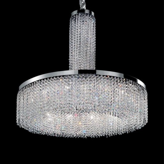 The Cut Crystal Round Chandelier exudes luxury with its two tiers of cascading, sparkling crystals that hang from a sleek silver frame. It features a stunning cylindrical column of crystals connecting it seamlessly to the ceiling mount, all set against a black background that highlights its brilliance and elegance.