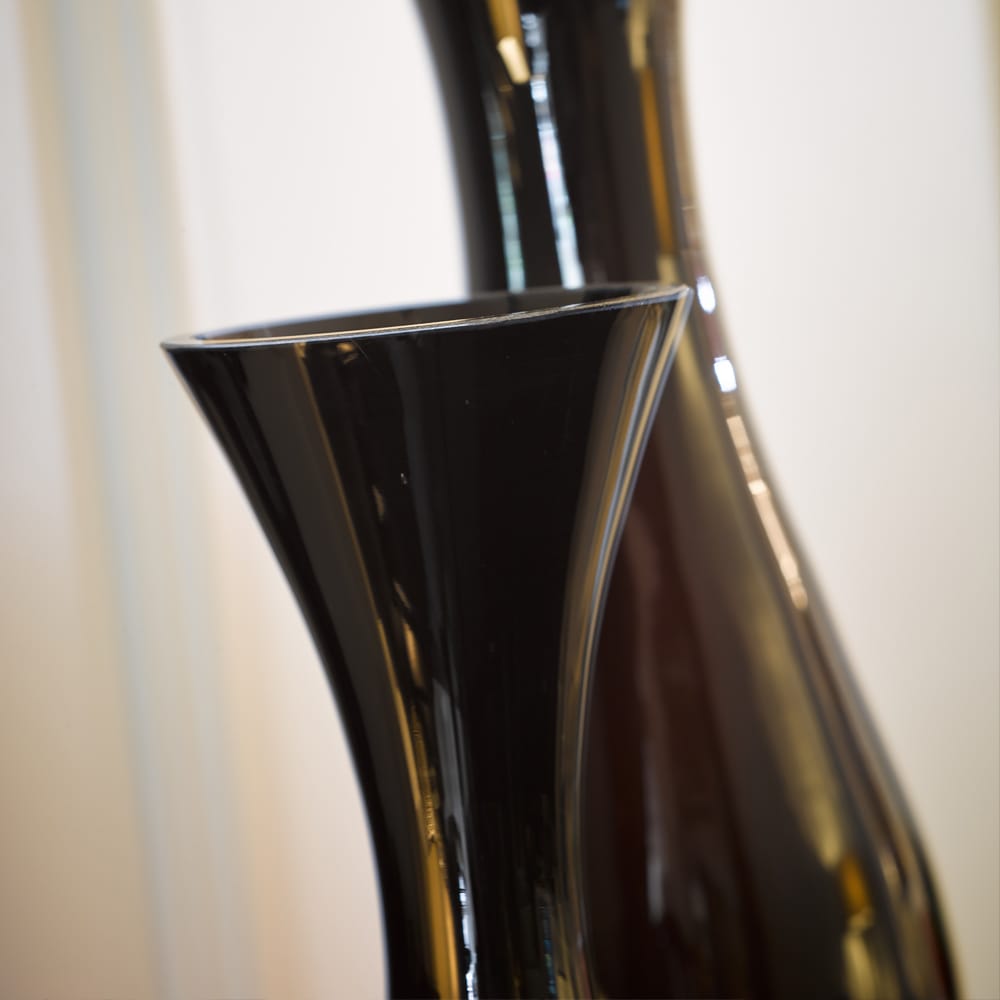 Two Tall Silver And Black Designer Glass Vases
