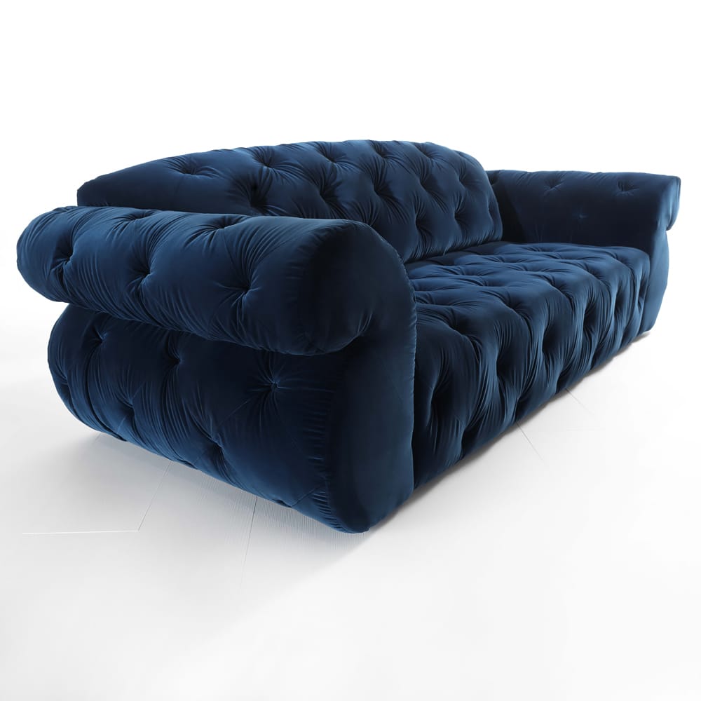 cosy edit, deep buttoned blue velvet sofa