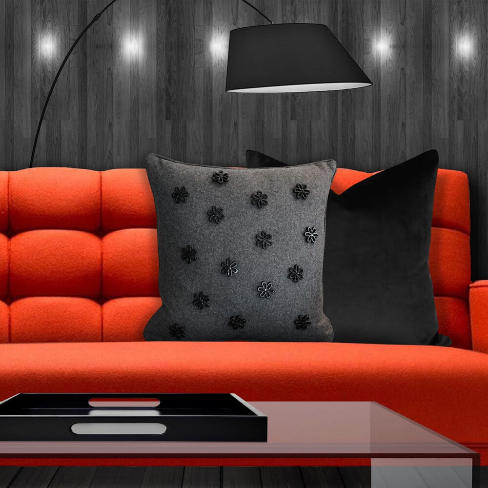 interior design trends 2020, dark grey woollen daisy cushion