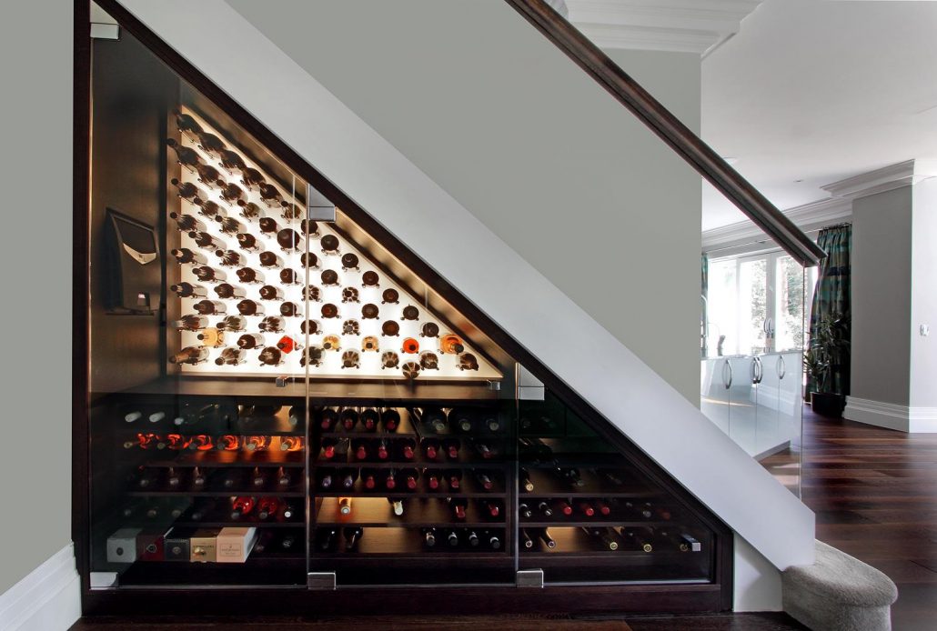 under stairs wine cellar with glass doors