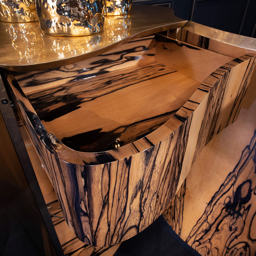 ebony wood interior of drawers in luxury bureau