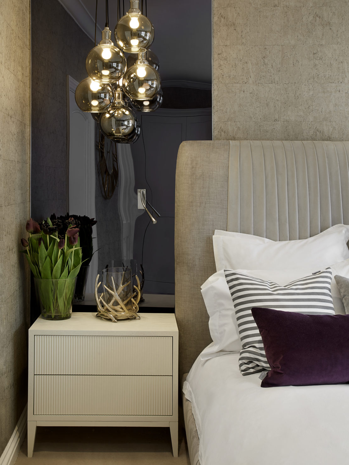 Luxury bedside cabinet and decadent bed with luxurious head board