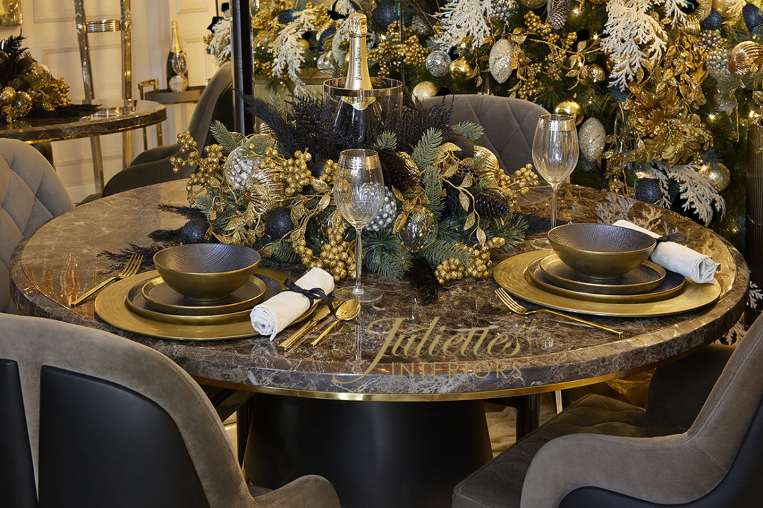 Christmas table design black and gold on moderns marble dinig table and chairs in a dining room setting 