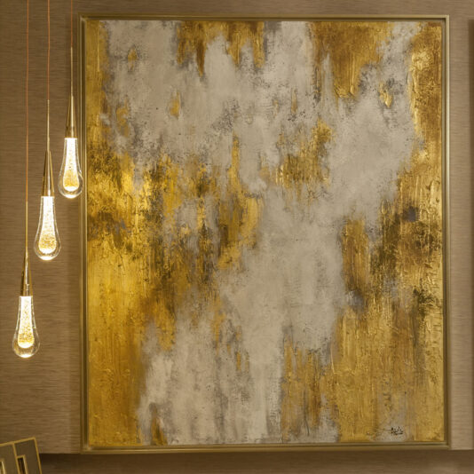 A large abstract painting is mounted on the wall, showcasing textured swirls and patches in golden yellow, white, and gray. The Set of 3 Glass Drop Pendant Lights with exposed bulbs and a minimalistic design casts a warm glow that beautifully illuminates the artwork.