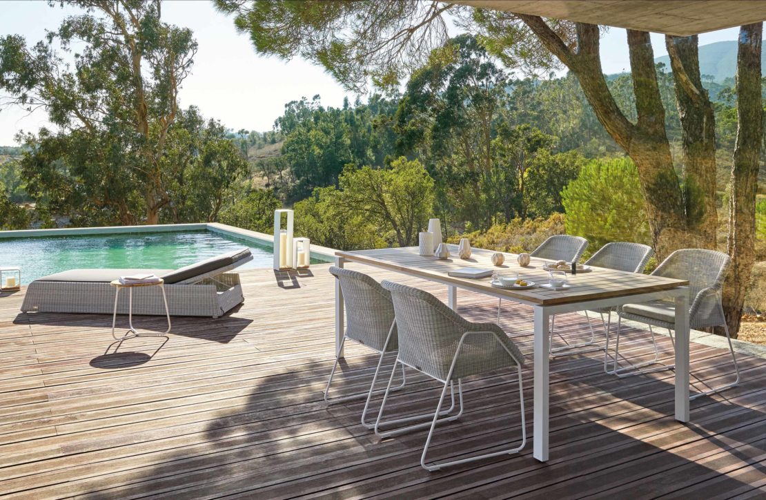 Luxury garden dining table by the pool for dining al-fresco