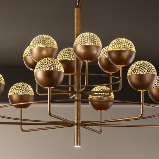 Large Modern Round Pendant Chandelier The Large Modern Round Pendant Chandelier boasts a bronze metal frame and houses multiple spherical lights. Each sphere is half-covered with bronze and features a mesh-like texture on the illuminated section, casting a warm golden glow that enhances its elegant and contemporary design.