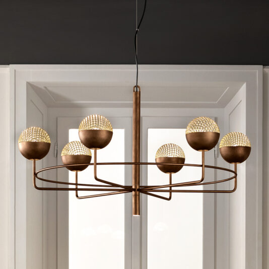 Modern Round Pendant Chandelier features a central rod with six horizontal arms extending outward, each supporting a textured spherical light. This elegant and minimalist chandelier is beautifully set against a white window frame background.