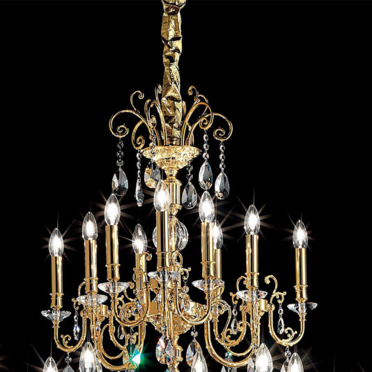 Classic Gold Transparent Chandelier The Classic Gold Transparent Chandelier, adorned with crystal accents and set against a black background, features multiple ornate arms holding candle-like light bulbs that emit a bright, warm glow. Elegantly hanging crystal droplets add a touch of sophistication to the overall design.