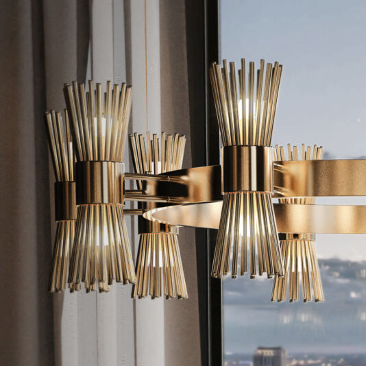 Contemporary Gold Plated Chandelier A Contemporary Gold Plated Chandelier with spiky rod designs reflects in a window, featuring multiple light bulbs encased in cylindrical gold frames. This sophisticated and modern lighting piece stands out beautifully against a neutral-colored curtain background.
