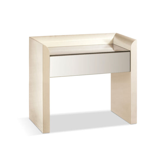 A modern, minimalist vanity table with a beige finish featuring clean, angular lines. The table has a single drawer and a mirrored front drawer panel, with open sides and a raised back. Its simple, sleek design complements contemporary interiors and pairs well with the Black Mother of Pearl Bedside Cabinet.