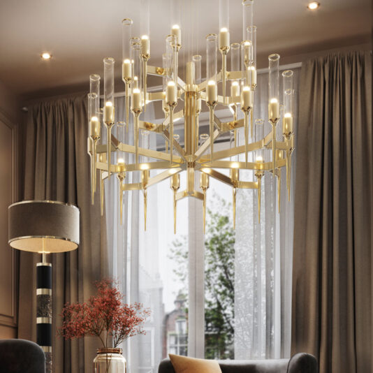 Contemporary Glass Flute Chandelier A luxurious, modern living room featuring a sophisticated Contemporary Glass Flute Chandelier hanging from the ceiling. Below the chandelier is a black and gold floor lamp, a vase with red foliage, and beige curtains framing large windows with a scenic outdoor view.