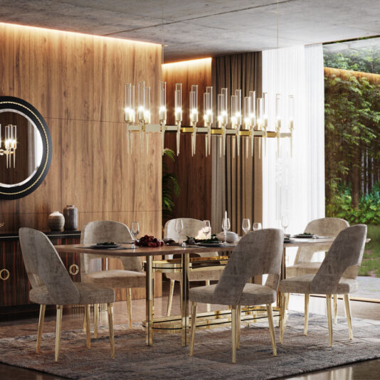 A modern dining room showcases a sleek glass table with gold accents, encircled by six plush beige upholstered chairs. The striking Contemporary Snooker Glass Flute Chandelier hangs overhead, while a large mirror with a gold frame adorns the wooden accent wall.