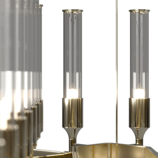 Close-up view of the Contemporary Snooker Glass Flute Chandelier featuring multiple tall, cylindrical glass shades reminiscent of glass flutes. Light bulbs inside the shades are glowing, illuminating the elegant metallic finish. The background is minimal and white.