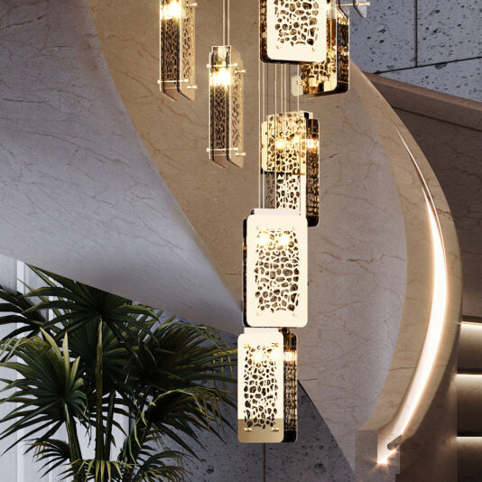 The Contemporary Stairwell Chandelier, a modern multi-tiered pendant light fixture adorned with intricate rectangular perforated panels, hangs elegantly from a high ceiling. In the background, a winding marble staircase, a plant with large leaves, and textured walls complete the sophisticated scene.