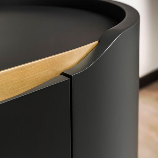 Close-up of the Large Modern Curved Cabinet showcasing its contemporary design with a wooden top edge. The cabinet features smooth, clean lines and a seamless blend of materials, accentuating its minimalistic aesthetic.