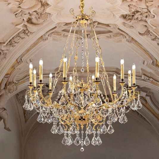 The Large Opulent Crystal Pendant Chandelier, featuring multiple arms adorned with numerous crystal droplets and candle-like bulbs, hangs from an ornate ceiling with intricate plasterwork and decorative molding, exuding a sense of grandeur and elegance.