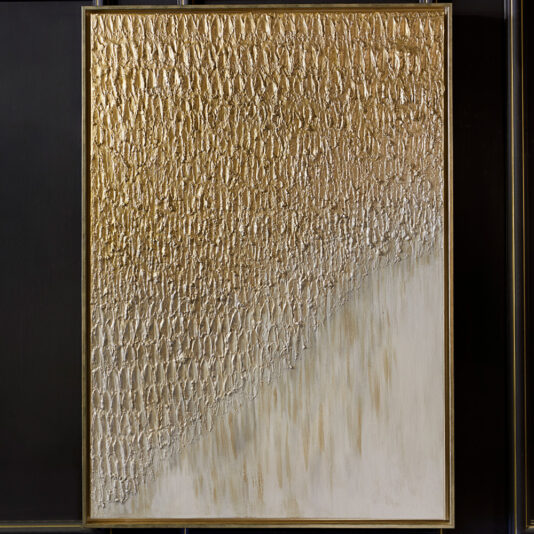 A piece from the Set of Original Abstract Paintings, featuring a textured abstract design with a rough, grid-like pattern in metallic gold that covers the upper left area and gradually transitions to a smooth beige in the lower right. This framed artwork is set against a dark background to emphasize its tactile gradient effect.