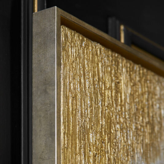 Close-up view of the Set of Original Abstract Paintings, showcasing textured gold-toned wall art pieces framed in metallic rectangular frames. The intricate ridged surfaces combine rough and smooth elements, all mounted on a striking black background.