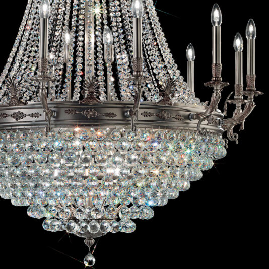 Antiqued Chrome Crystal Empire Chandelier An opulent Antiqued Chrome Crystal Empire Chandelier featuring multiple tiers of gleaming crystals, complemented by candle-like light bulbs and finished in antiqued chrome, set against a black backdrop. The chandelier radiates a stunning array of light reflections, presenting an elegant and majestic ambiance.