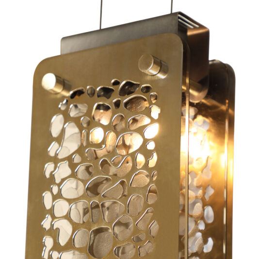 Contemporary Pendant Light A close-up photograph of the Contemporary Pendant Light, showcasing its decorative gold metal frame with an intricate cutout pattern that resembles organic, pebble-like shapes. The warm light glows through the openings in the frame, and it hangs elegantly from a thin cable.