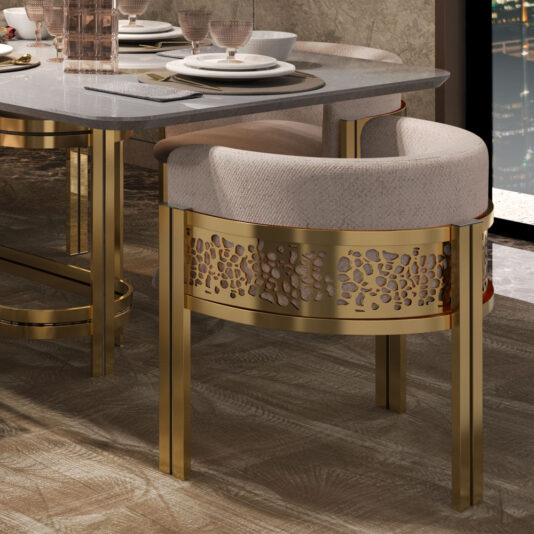 A modern dining area featuring a marble-topped table with gold accent legs and Exclusive Curved Dining Chairs. The chairs boast gold detailing and light-colored cushioning, perfectly complementing the wood-patterned floor and soft lighting.