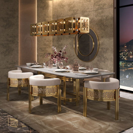 Elegant dining room with a long marble table set for six, featuring Exclusive Curved Dining Chairs in gold with white cushions. A modern gold chandelier hangs above, and a circular wall mirror adorns one side. Large windows provide a stunning night cityscape view. The decor is highlighted by a floral centerpiece positioned at the center of the table.