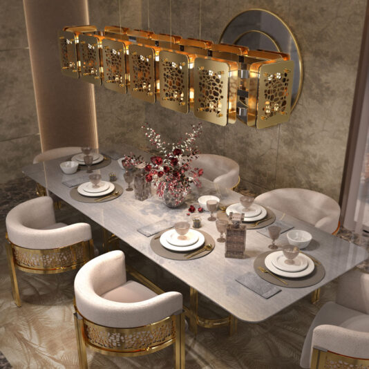 A luxurious dining room features a marble table set for six with elegant place settings. Exclusive Curved Dining Chairs with gold accents complement a golden chandelier hanging above. A vase with red and white flowers is centered on the table, which stands against a sophisticated, textured wall.