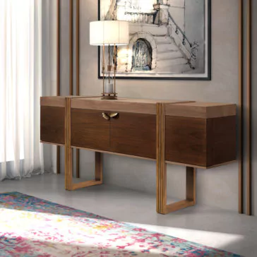 Modern Elegant Sideboard A modern, elegant living room features the Modern Elegant Sideboard with a unique mid-century design. A lamp and an abstract painting adorn the top. Sunlight filters through sheer curtains, illuminating a colorful area rug on the concrete floor.
