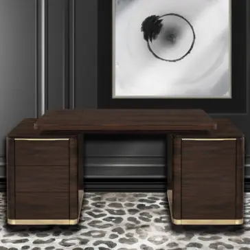 Modern Vanity With Brass Accents A modern, minimalist room showcases the Modern Vanity With Brass Accents, a sleek piece that epitomizes refined design. The vanity is placed on a textured leopard-print rug. Enhancing the sophisticated atmosphere is a large, abstract black-and-white artwork hanging on the dark wall behind it, adding an artistic touch to the space.