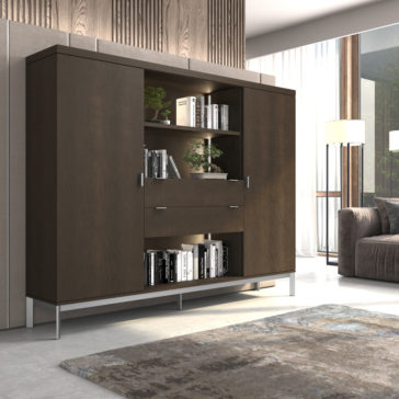 Modern Wooden Bookcase A modern living room features a sleek, dark wooden cabinet with open shelves displaying books and potted plants. The Modern Wooden Bookcase has closed compartments illuminated by LED lights, and the room is adorned with a large window, brown couch, floor lamp, and a textured rug on a light floor.