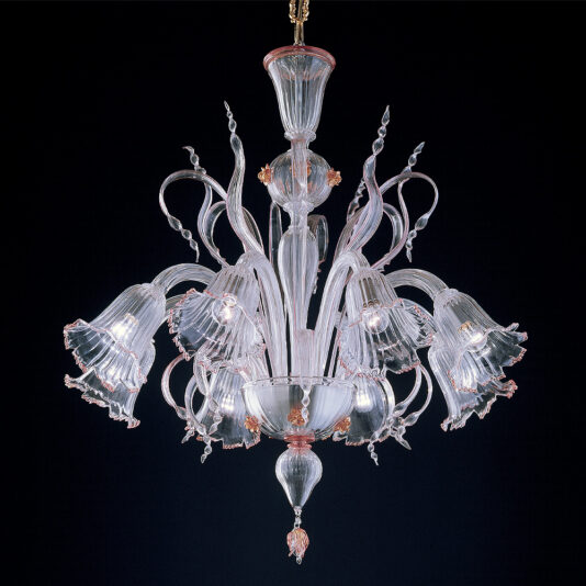 The Classic Floral Detail Chandelier, featuring intricately curved arms made of clear glass and classic floral-shaped light covers, radiates a delicate and elegant appearance against a dark background.