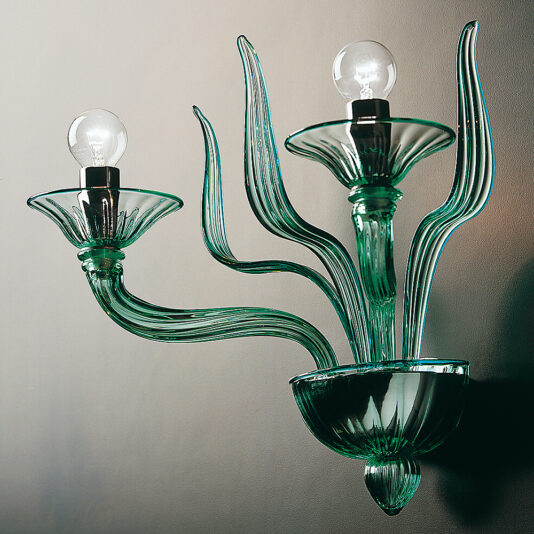 The Classic Green Glass Ribbed Detail Wall Light features two exposed light bulbs at the top and showcases a design that resembles flowing leaves or petals, adding an elegant and artistic touch to any wall with its sophisticated shape.
