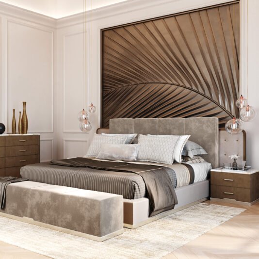 A modern bedroom furnished with the Exclusive Designer Bed With Panelled Headboard, featuring gray and white bedding, and flanked by matching nightstands. The backdrop includes a large metallic palm leaf wall art. Hanging pendant lights, decorative vases, and a beige bench complete the elegant decor.
