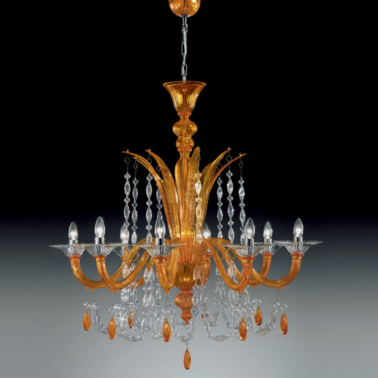 The Luxury Orange Crystal Drop Chandelier, featuring an ornate and classical design with eight arms, lit candle-like bulbs, gold-colored decorative elements, and hanging clear orange crystal drops, is set against a gradient background from dark to light.