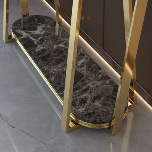 Luxury Premium Marble Console Table A sleek, modern Luxury Premium Marble Console Table featuring gold metal legs and a polished black top with white and gray veining, placed on a smooth gray floor against a dark wall. The design is minimalistic and luxurious, emphasizing the elegance of premium materials used.