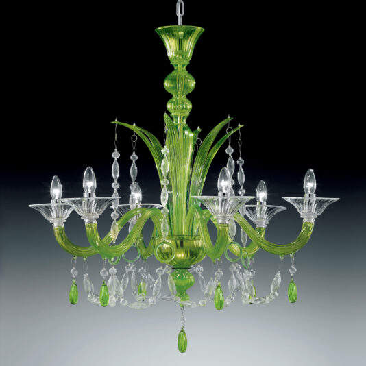 The Statement Green Crystal Drop Chandelier is an exquisite piece, featuring eight candle-like light bulbs gracefully suspended from elegantly curved arms made of green and clear glass. This chandelier is adorned with intricate crystal drop ornaments, including teardrop-shaped designs, all beautifully set against a gradient gray background.