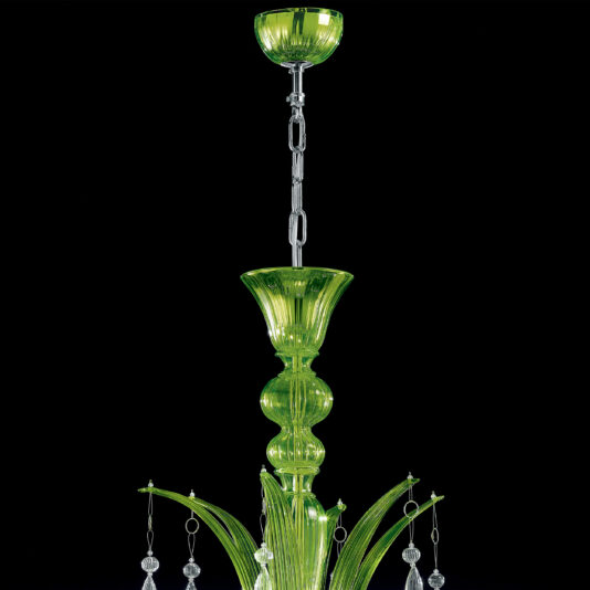 Statement Green Crystal Drop Chandelier The image showcases the Statement Green Crystal Drop Chandelier, an elegant fixture with intricate detailing, suspended from a ceiling chain. It features a series of gracefully curved green glass arms and hanging ornaments, exuding a sophisticated and stylish appearance against a black background.