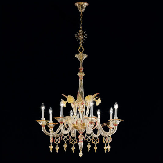 The Classic Ornate Gold And Red Glass Chandelier is a luxurious crystal chandelier with an intricate design, featuring multiple ornate arms, each holding a lit candle-shaped bulb. This classic piece boasts decorative elements, all beautifully suspended against a black background.